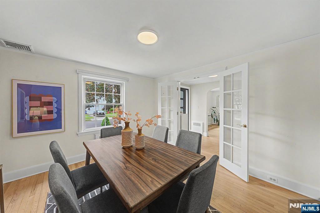 45 Highfield Road Bloomfield, NJ 07003 - Photo 24 of 50 a view of a dining room with furniture and wooden floor