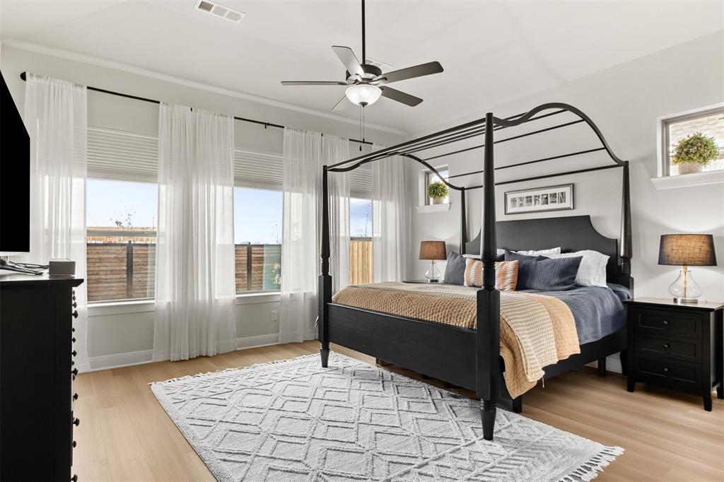 2708 Darlington Road Northlake, TX 76226 - Photo 21 of 40 a bedroom with a large bed and a window