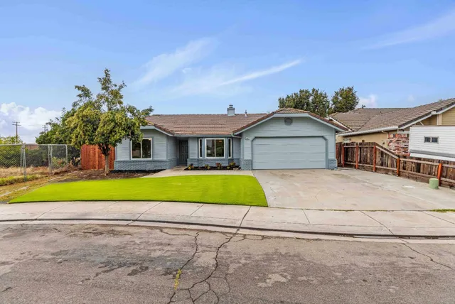 a front view of a house with a swimming pool