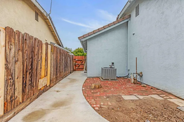 a view of a backyard of the house