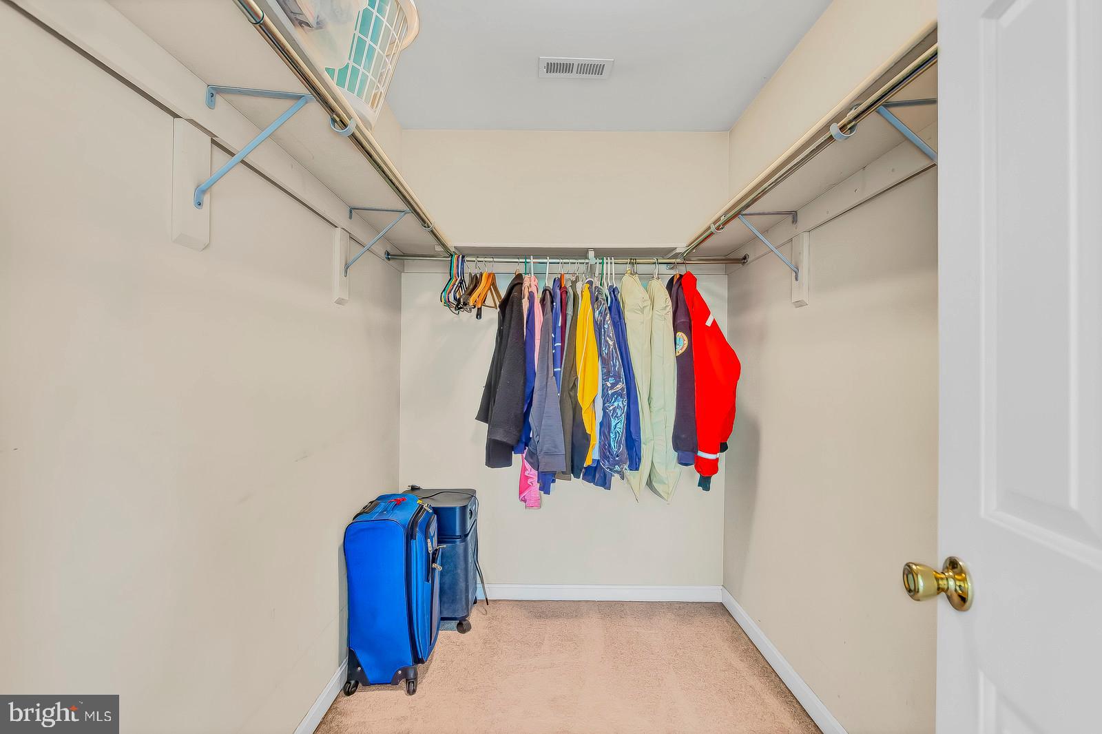 6815 Mackall Road St. Leonard, MD 20685 - Photo 18 of 38 a view of a walk in closet