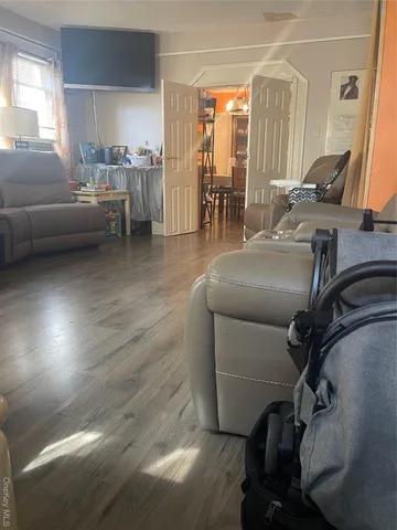 a living room with furniture and a table