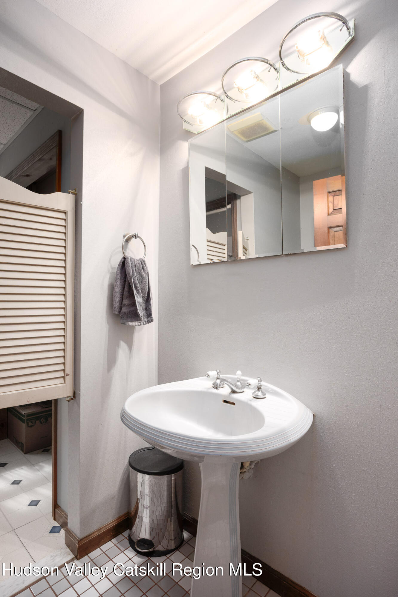 94 Tanglewood Road West Hurley, NY 12491 - Photo 11 of 34 a bathroom with a sink and a mirror