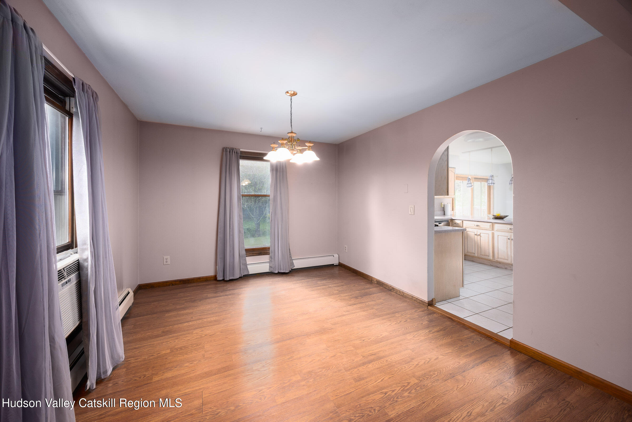 94 Tanglewood Road West Hurley, NY 12491 - Photo 6 of 34 wooden floor in an empty room with a window