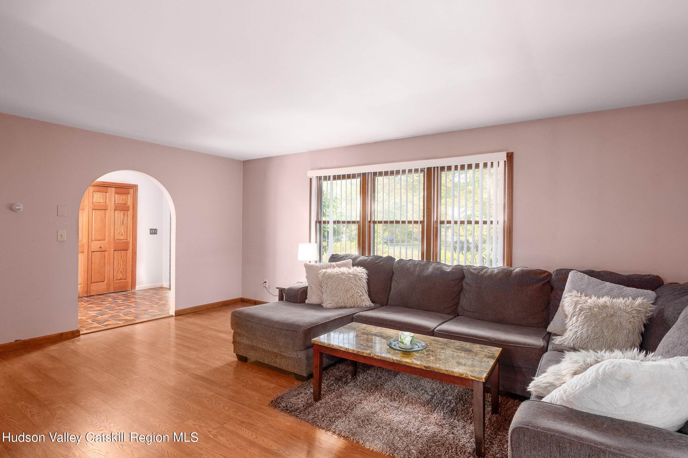 94 Tanglewood Road West Hurley, NY 12491 - Photo 7 of 34 a living room with furniture and a large window