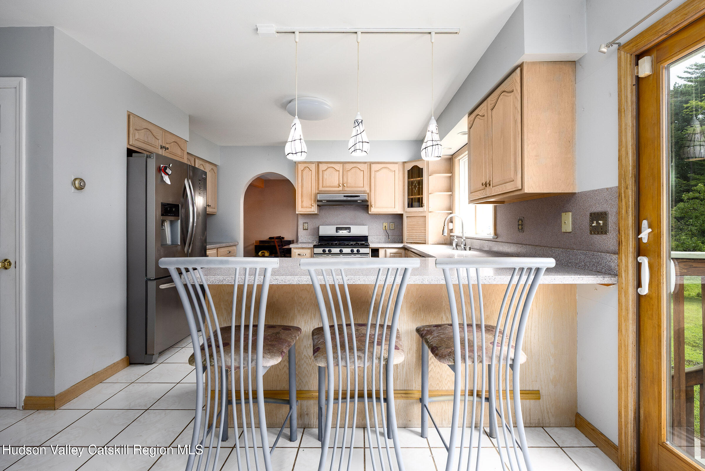 94 Tanglewood Road West Hurley, NY 12491 - Photo 9 of 34 a view of a dining room with furniture and a window