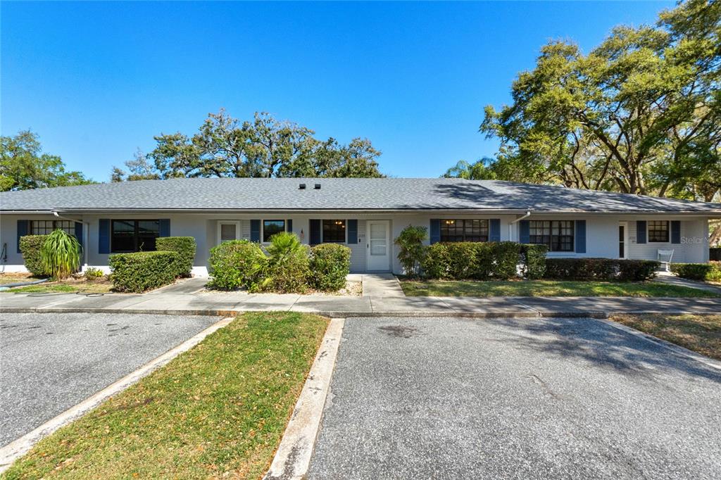2723 Beacon Street Eustis, FL 32726 - Photo 1 of 42 front view of a house with a patio