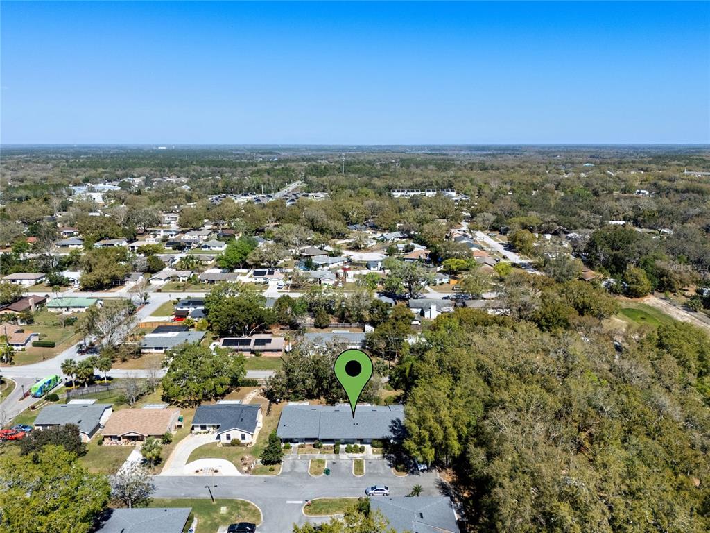 2723 Beacon Street Eustis, FL 32726 - Photo 31 of 42 an aerial view of residential houses with city view