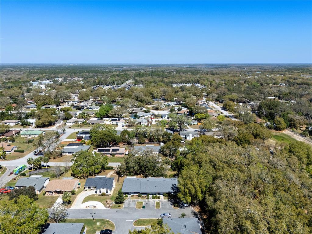 2723 Beacon Street Eustis, FL 32726 - Photo 32 of 42 an aerial view of residential houses with city view