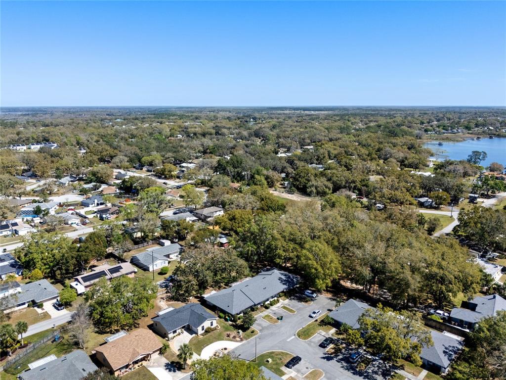 2723 Beacon Street Eustis, FL 32726 - Photo 33 of 42 an aerial view of a city with lots of residential buildings