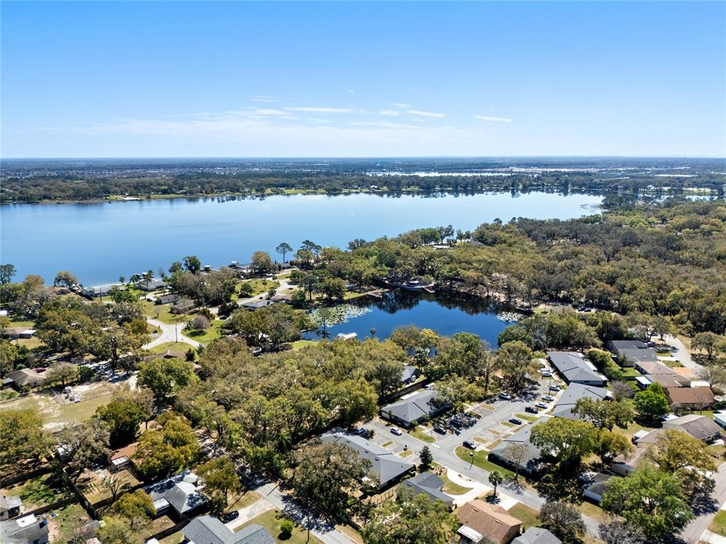 2723 Beacon Street Eustis, FL 32726 - Photo 36 of 42 a view of a lake with houses