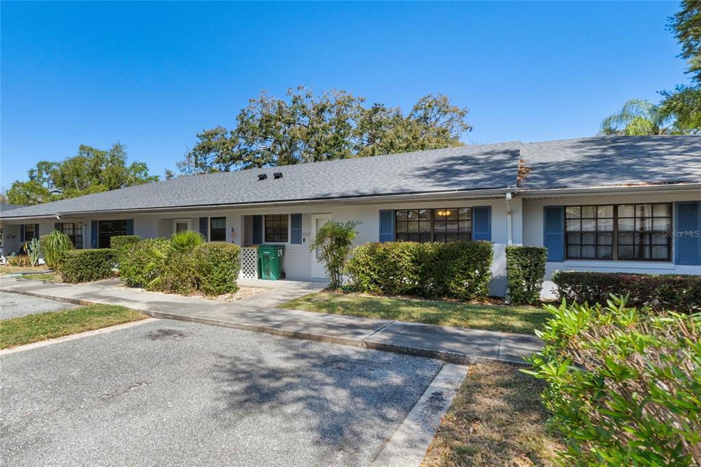 2723 Beacon Street Eustis, FL 32726 - Photo 5 of 42 a front view of a house with a yard