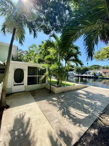 a view of a backyard with a sink and a fire pit