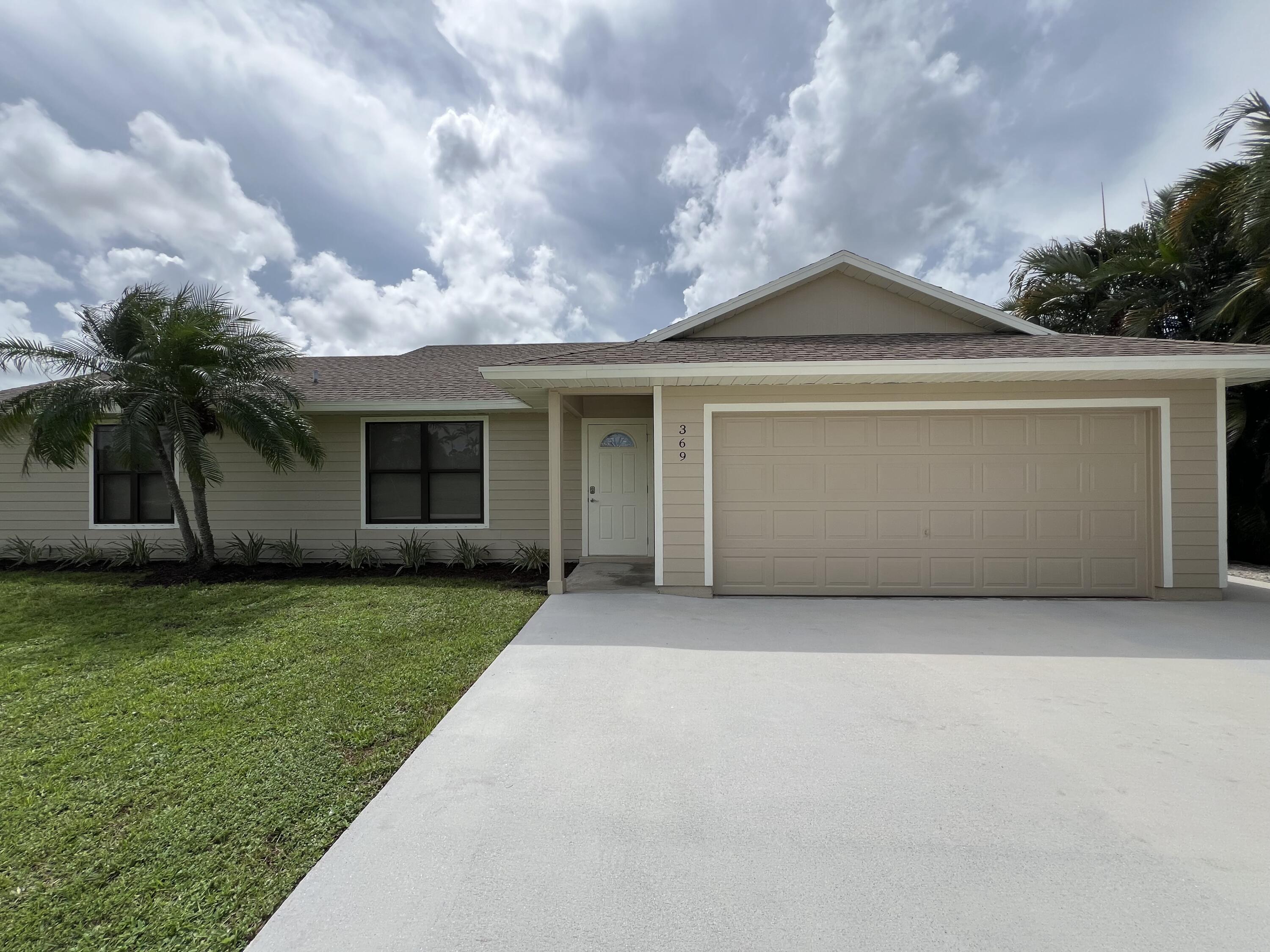 369 Southwest Ridgecrest Drive Port St. Lucie, FL 34953 - Photo 1 of 13 Front