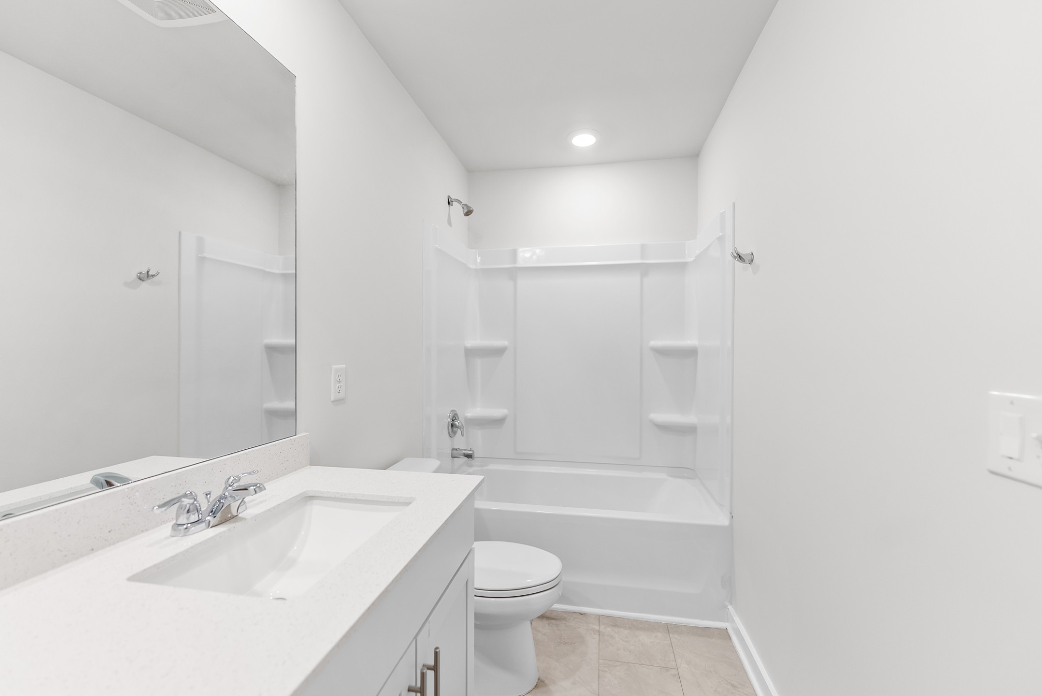 1255 Inverness Pass Lebanon, TN 37087 - Photo 35 of 40 a bathroom with a sink a toilet and shower