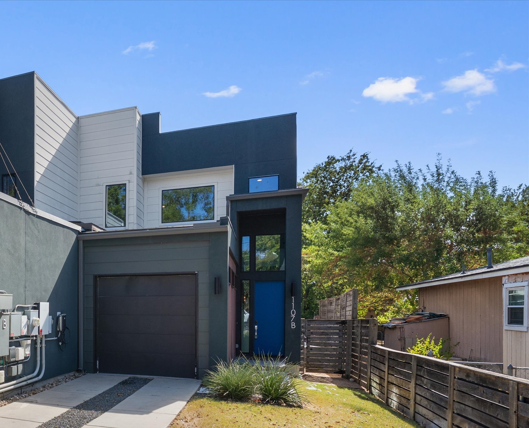 1107 Taulbee Lane, Unit B Austin, TX 78757 - Photo 2 of 37 Modern condo with one car garage