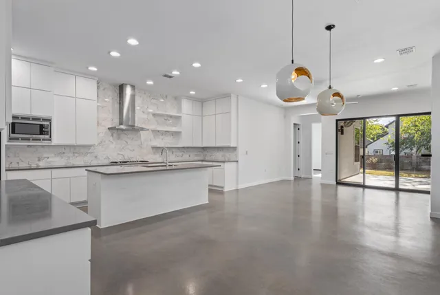 a living room with furniture fireplace and a flat screen tv