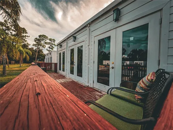 a backyard of a house with seating space