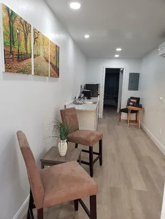 a view of a dining room with furniture