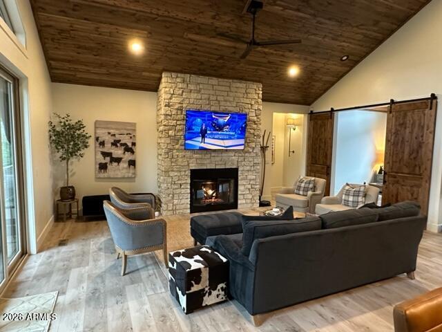 4260 West Falling Leaf Road Show Low, AZ 85901 - Photo 11 of 32 a living room with furniture a fireplace and a table