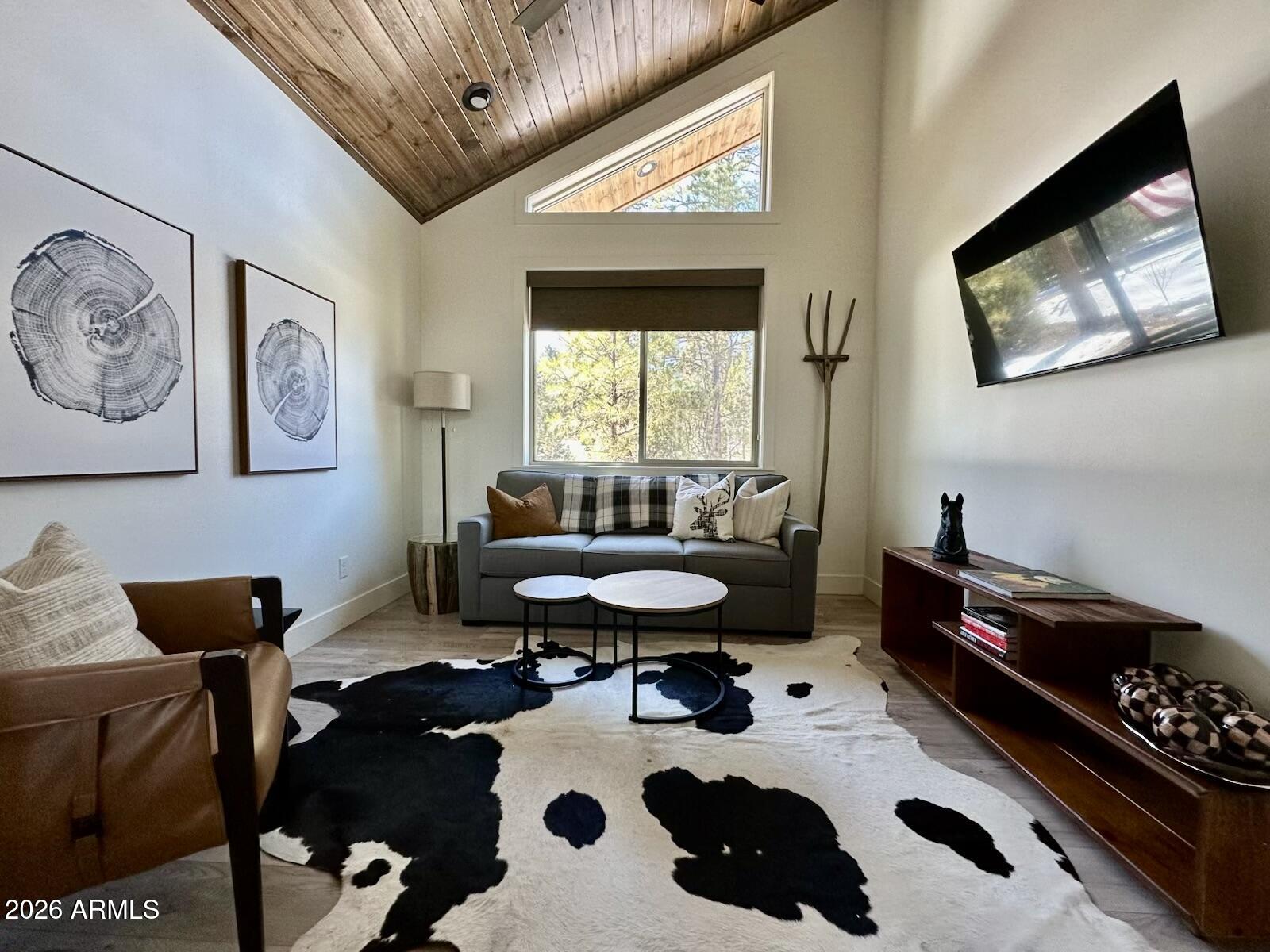 4260 West Falling Leaf Road Show Low, AZ 85901 - Photo 13 of 32 a living room with furniture and a window