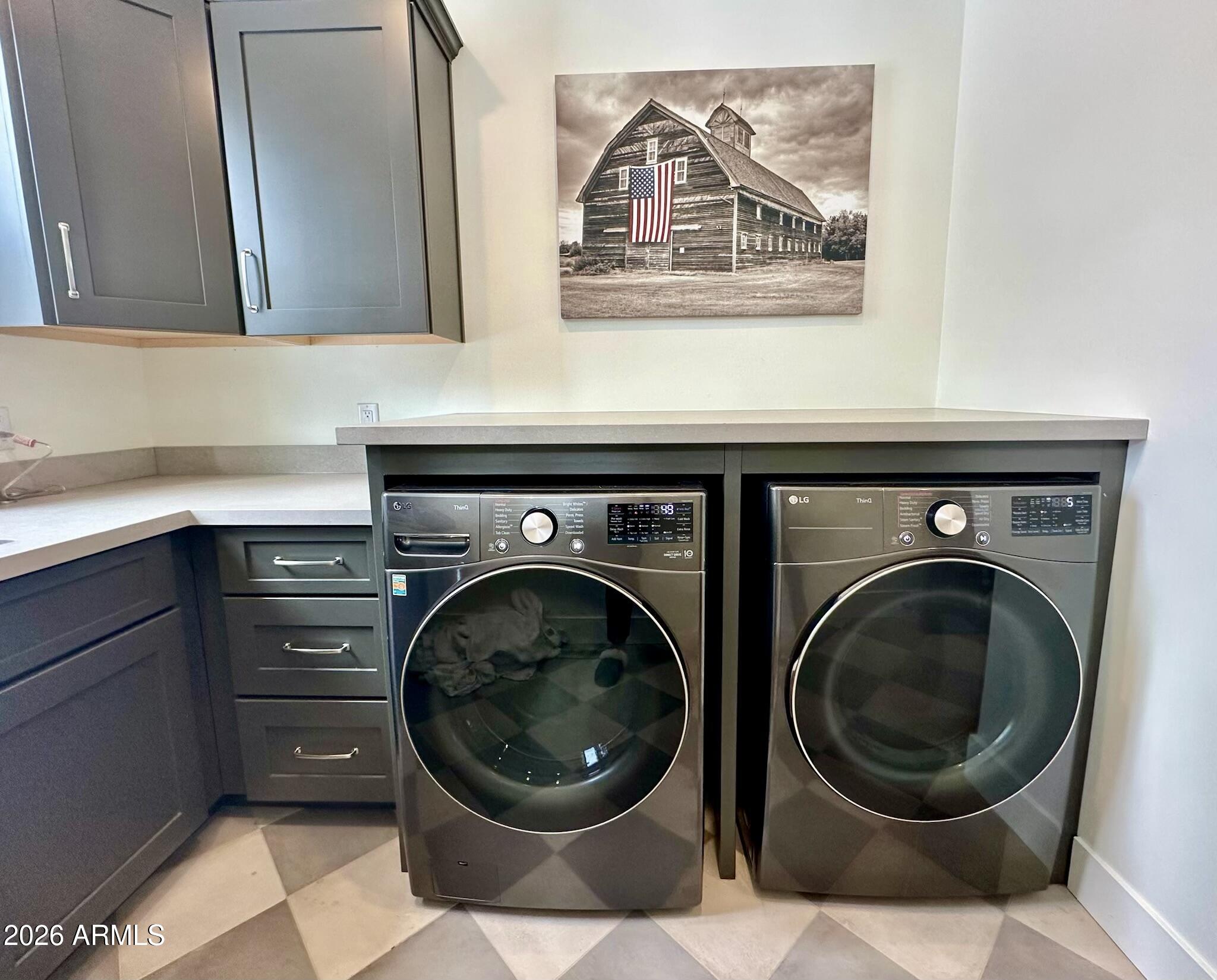 4260 West Falling Leaf Road Show Low, AZ 85901 - Photo 24 of 32 a close view of a utility room with dryer and washer