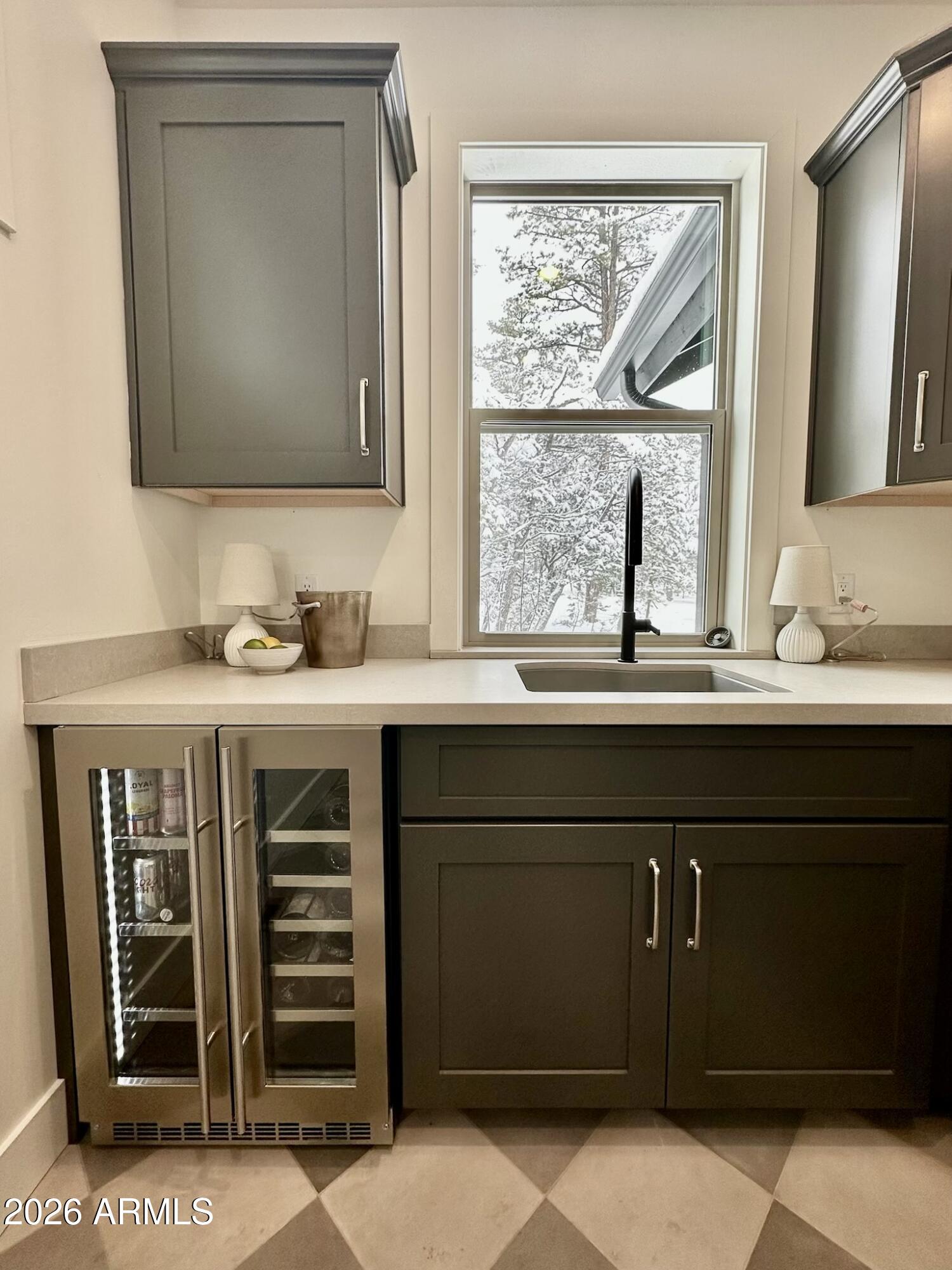 4260 West Falling Leaf Road Show Low, AZ 85901 - Photo 25 of 32 a bathroom with a sink and a mirror