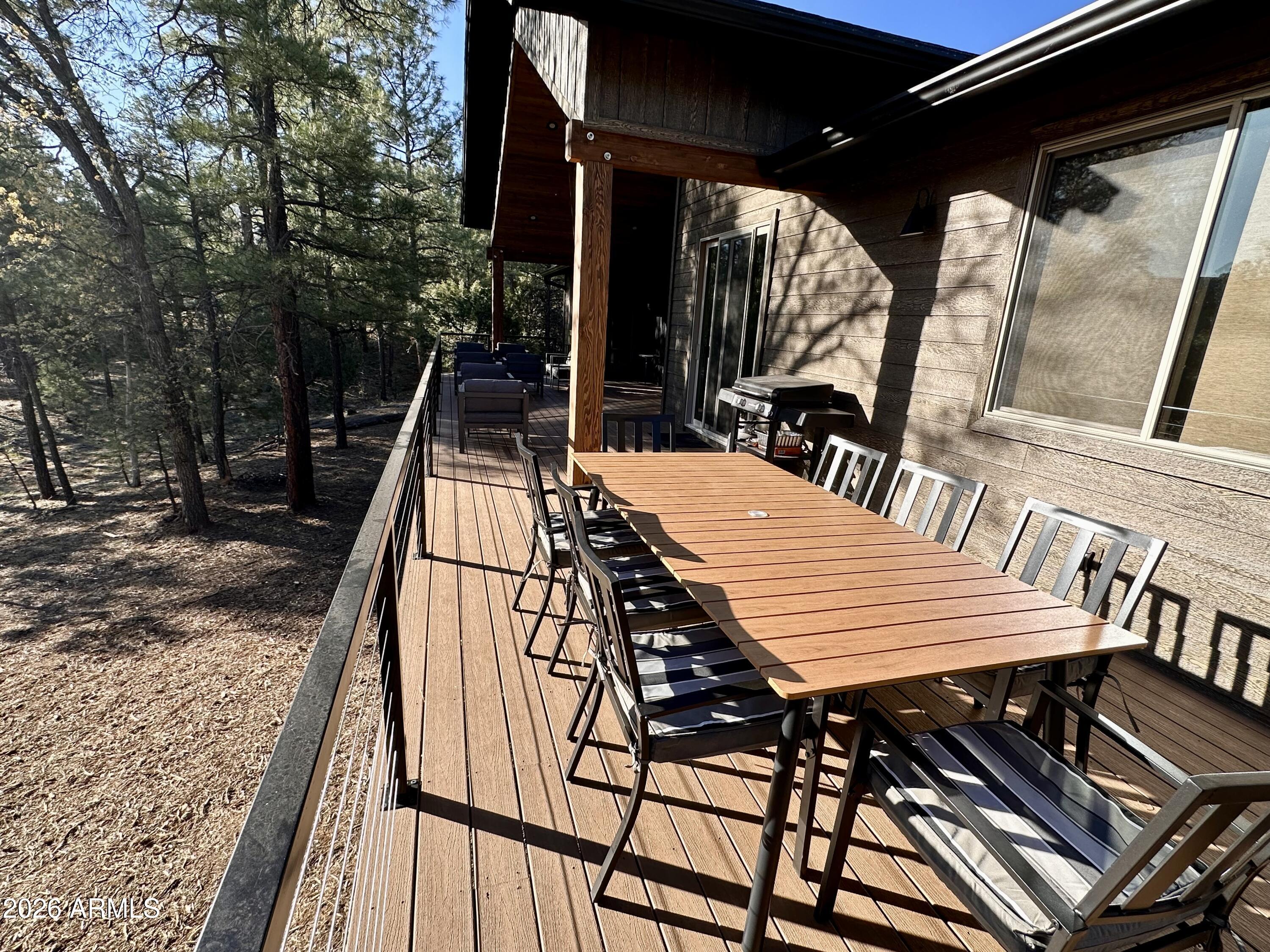 4260 West Falling Leaf Road Show Low, AZ 85901 - Photo 29 of 32 a view of a balcony with chairs