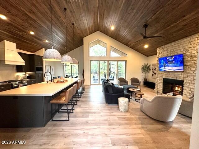 4260 West Falling Leaf Road Show Low, AZ 85901 - Photo 6 of 32 a living room with fireplace furniture and a large window