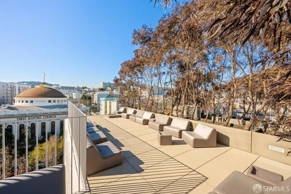 a view of a patio with a yard