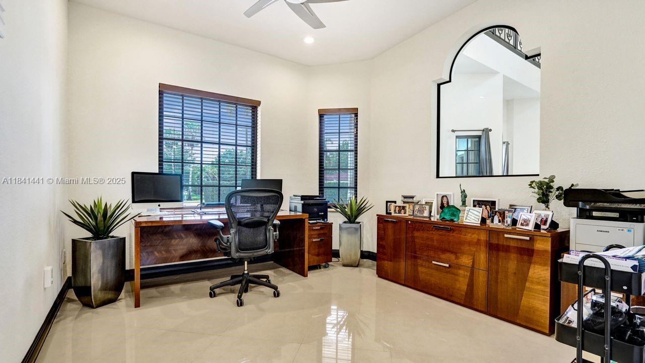 3311 Southwest 118th Terrace Davie, FL 33330 - Photo 57 of 95 a view of a workspace with furniture