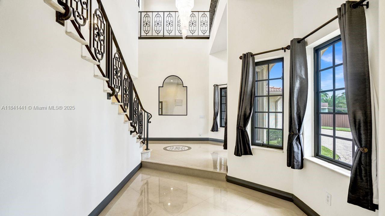 3311 Southwest 118th Terrace Davie, FL 33330 - Photo 7 of 95 a view of entryway and hall with a door