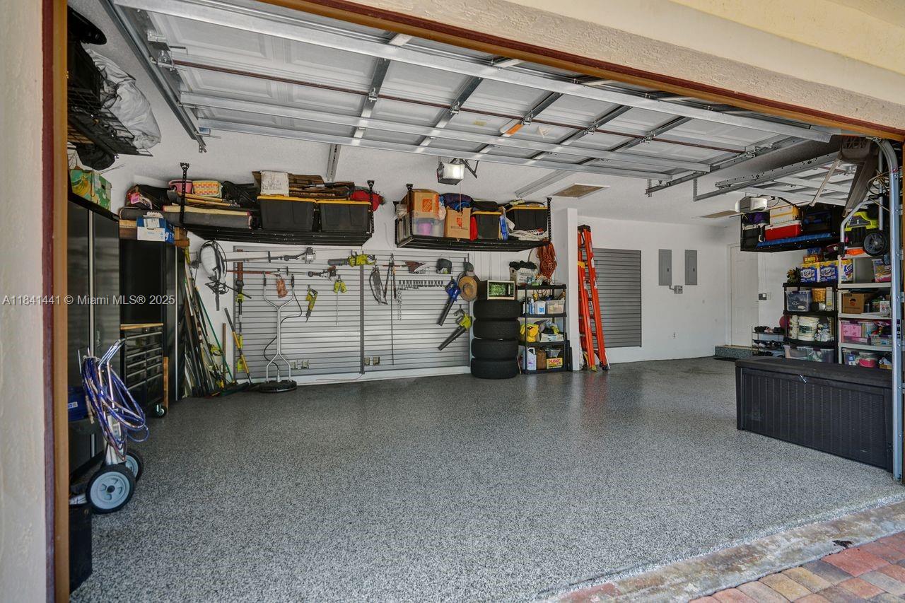 3311 Southwest 118th Terrace Davie, FL 33330 - Photo 77 of 95 a view of a storage room with racks