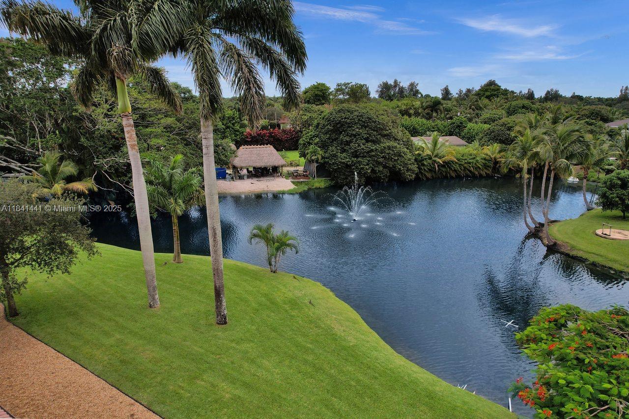 3311 Southwest 118th Terrace Davie, FL 33330 - Photo 78 of 95 a view of a lake with a yard