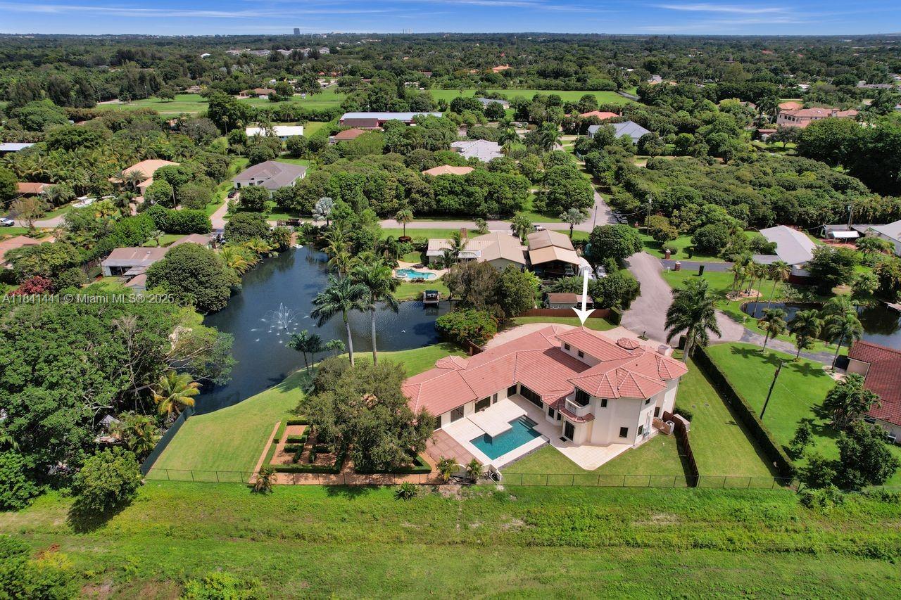 3311 Southwest 118th Terrace Davie, FL 33330 - Photo 80 of 95 an aerial view of a house with a garden