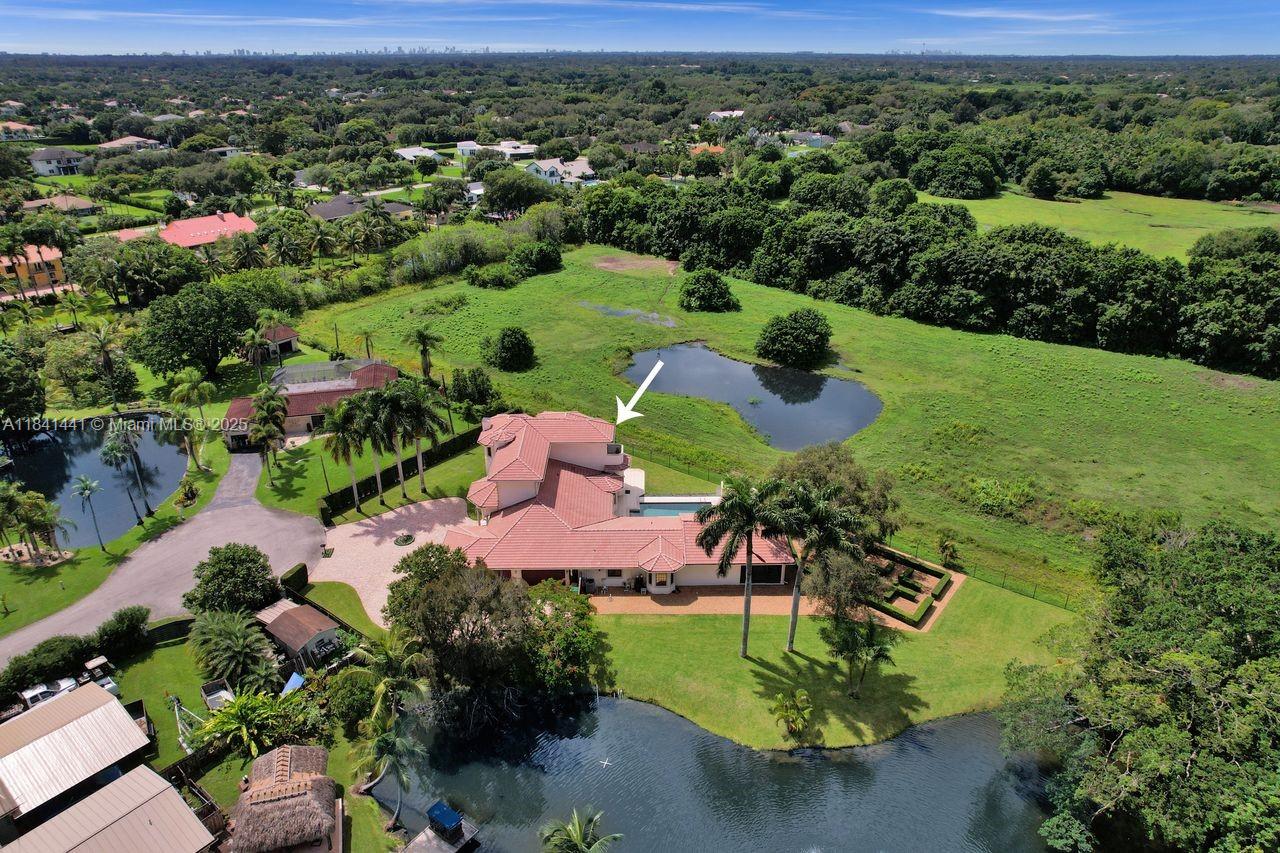 3311 Southwest 118th Terrace Davie, FL 33330 - Photo 83 of 95 an aerial view of a house with a garden