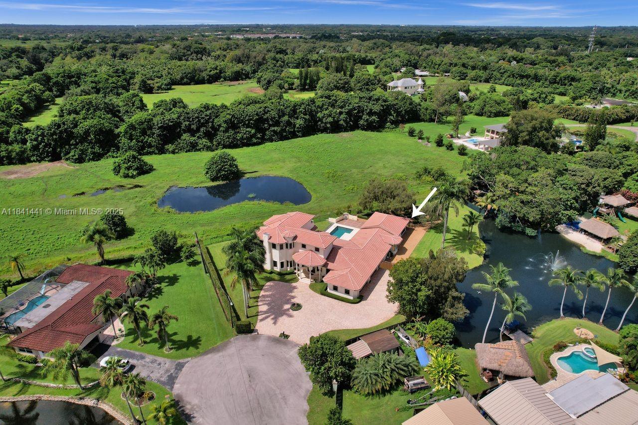 3311 Southwest 118th Terrace Davie, FL 33330 - Photo 86 of 95 an aerial view of a house with a yard