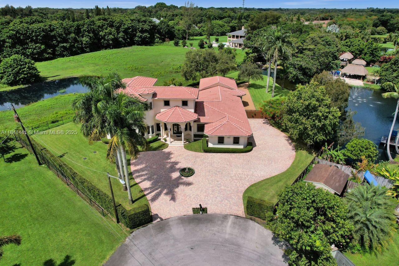 3311 Southwest 118th Terrace Davie, FL 33330 - Photo 89 of 95 an aerial view of a house with yard swimming pool and outdoor seating