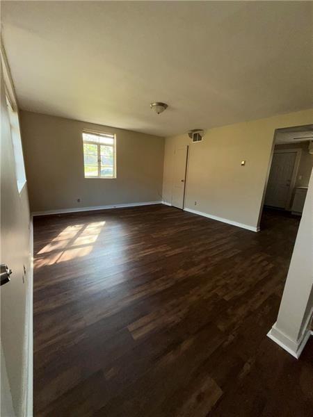 2701 Lincoln Avenue Clairton, PA 15025 - Photo 10 of 10 an empty room with wooden floor and windows
