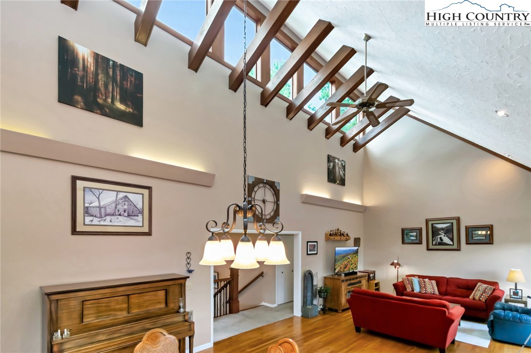 314 Heather Street Boone, NC 28607 - Photo 14 of 50 a living room with furniture and a chandelier