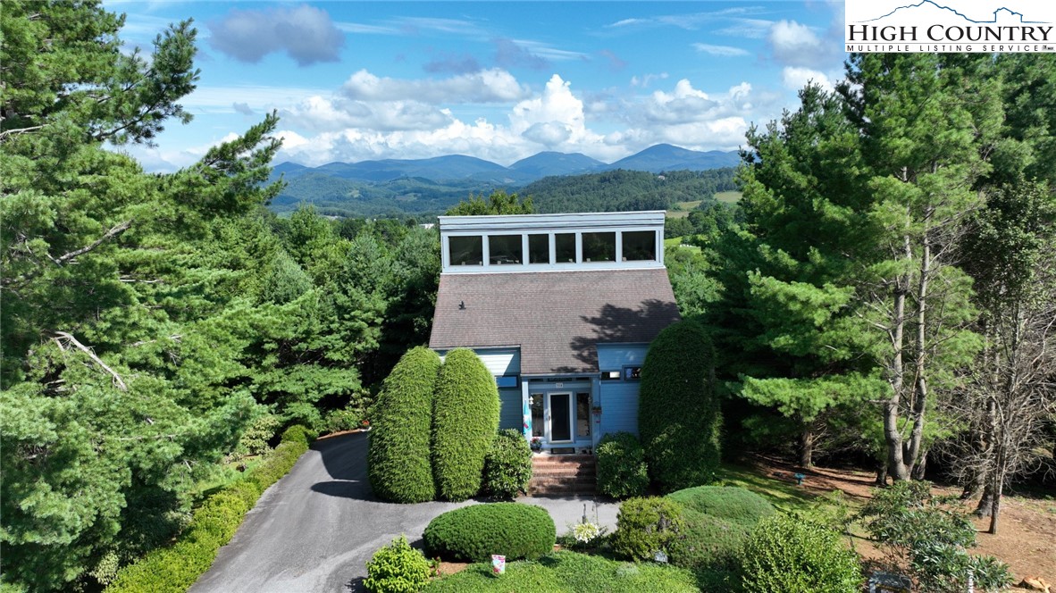 314 Heather Street Boone, NC 28607 - Photo 2 of 50 front view of a house with a garden