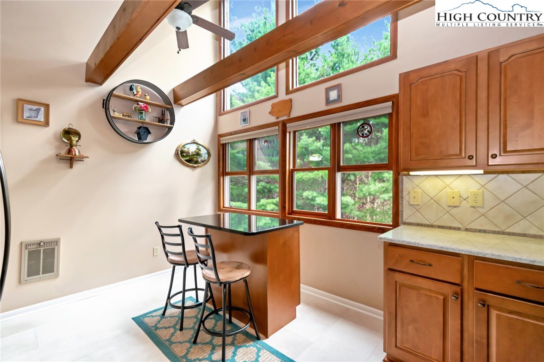 314 Heather Street Boone, NC 28607 - Photo 21 of 50 a view of a kitchen area with furniture and windows