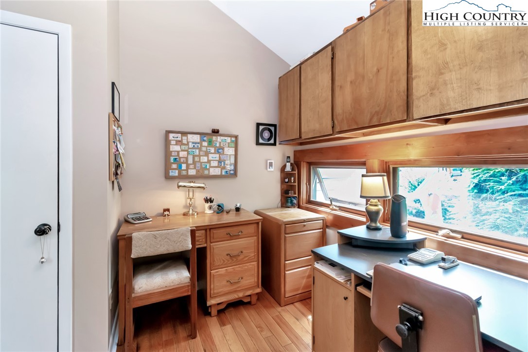 314 Heather Street Boone, NC 28607 - Photo 24 of 50 a view of a workspace with furniture and a window