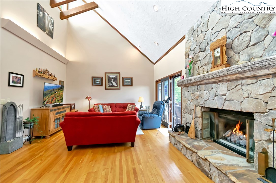 314 Heather Street Boone, NC 28607 - Photo 3 of 50 a living room with furniture and a fireplace