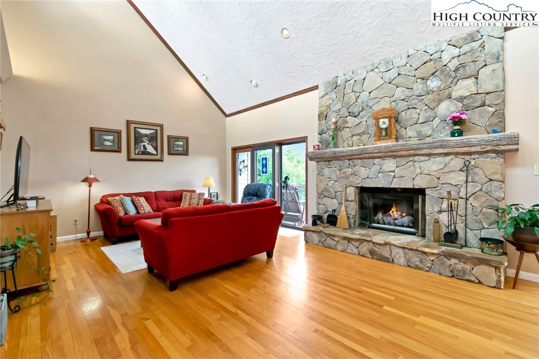 314 Heather Street Boone, NC 28607 - Photo 5 of 50 a living room with furniture and a fireplace