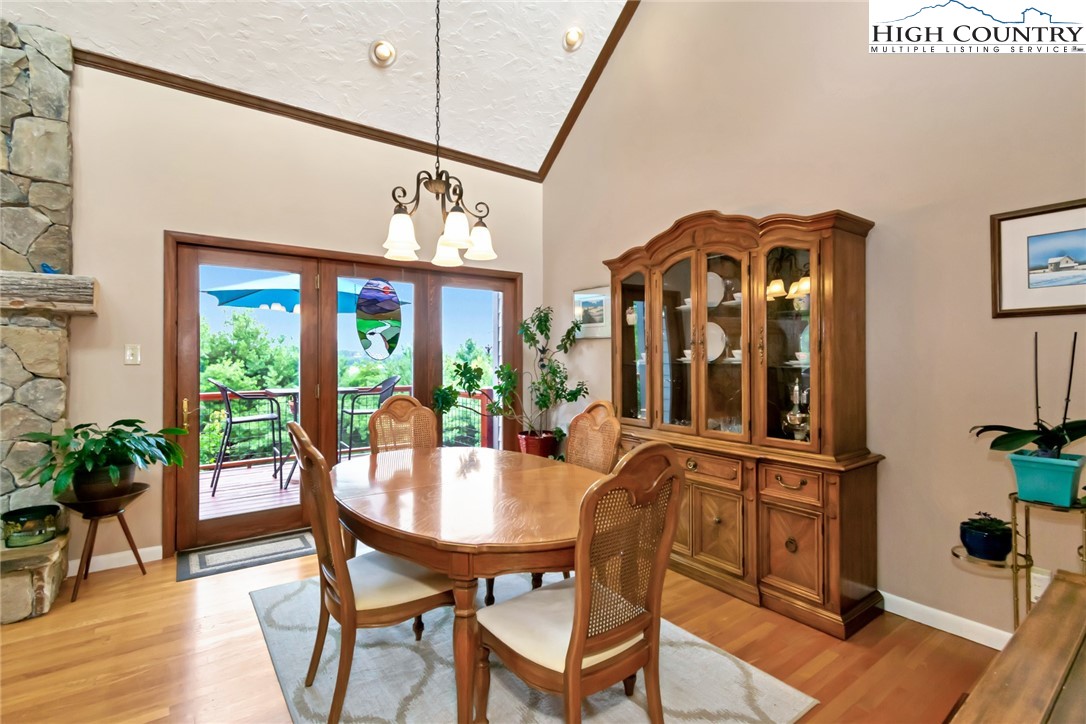 314 Heather Street Boone, NC 28607 - Photo 10 of 50 a view of a dining room with furniture window and wooden floor