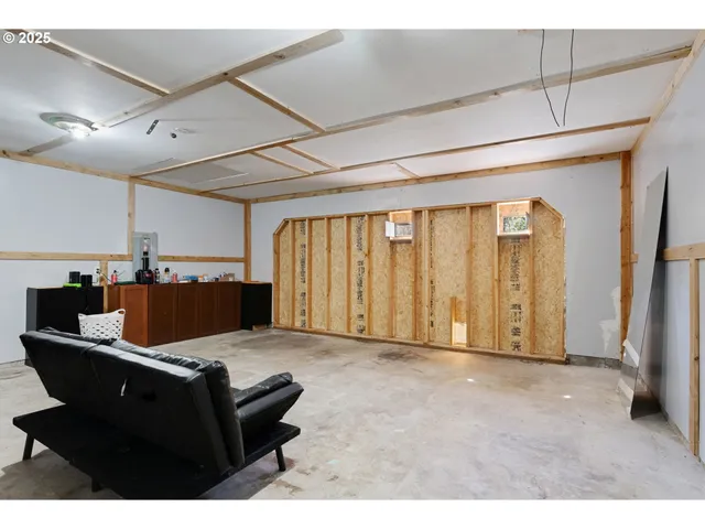 a view of room with furniture and a window