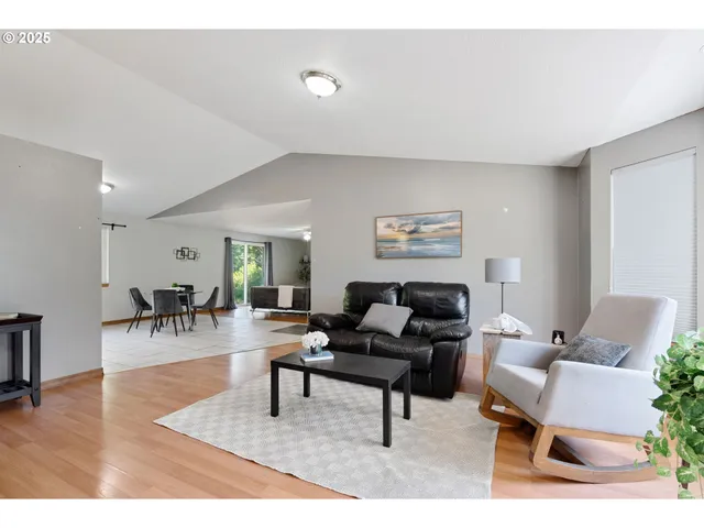 a living room with furniture and a couch