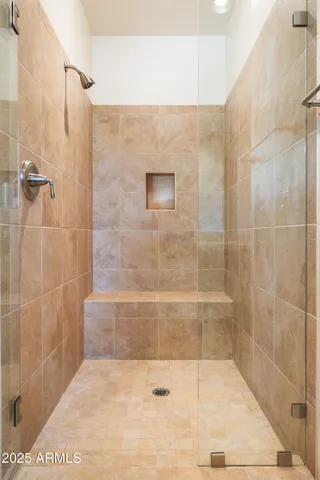 a bathroom with a sink and a shower