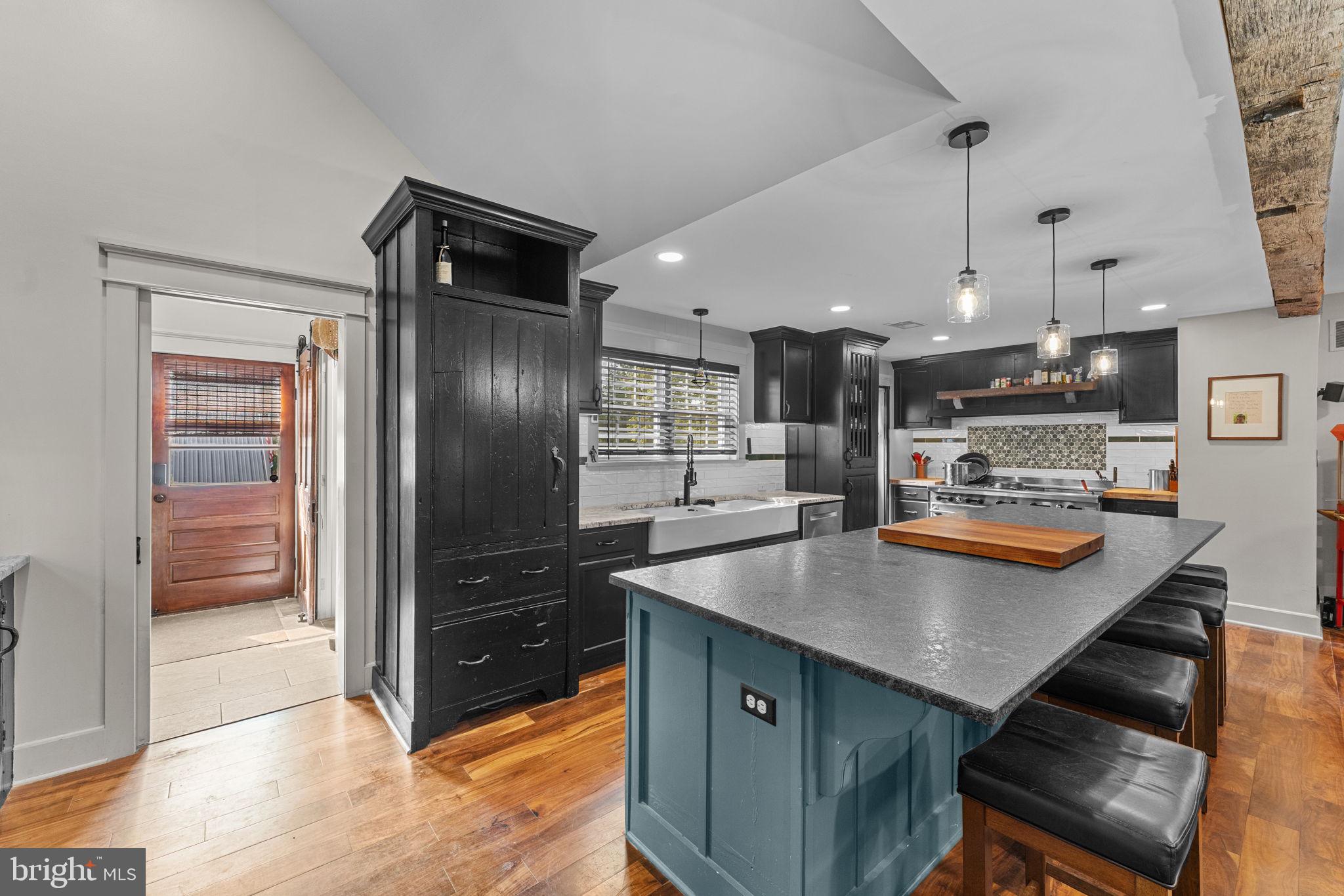 10 Arlington Road Malvern, PA 19355 - Photo 15 of 38 a kitchen with stainless steel appliances granite countertop a refrigerator and a sink